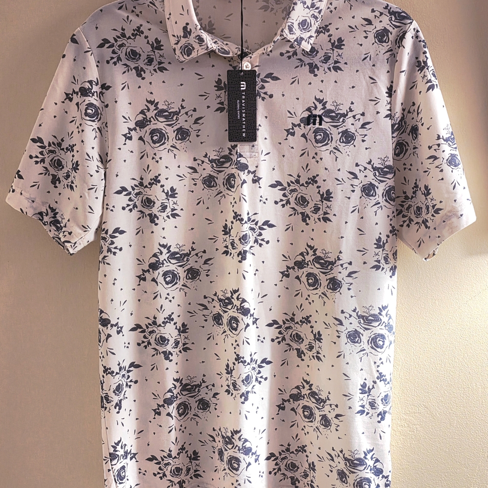 Travis Mathew White and Blue Floral Polo Shirt